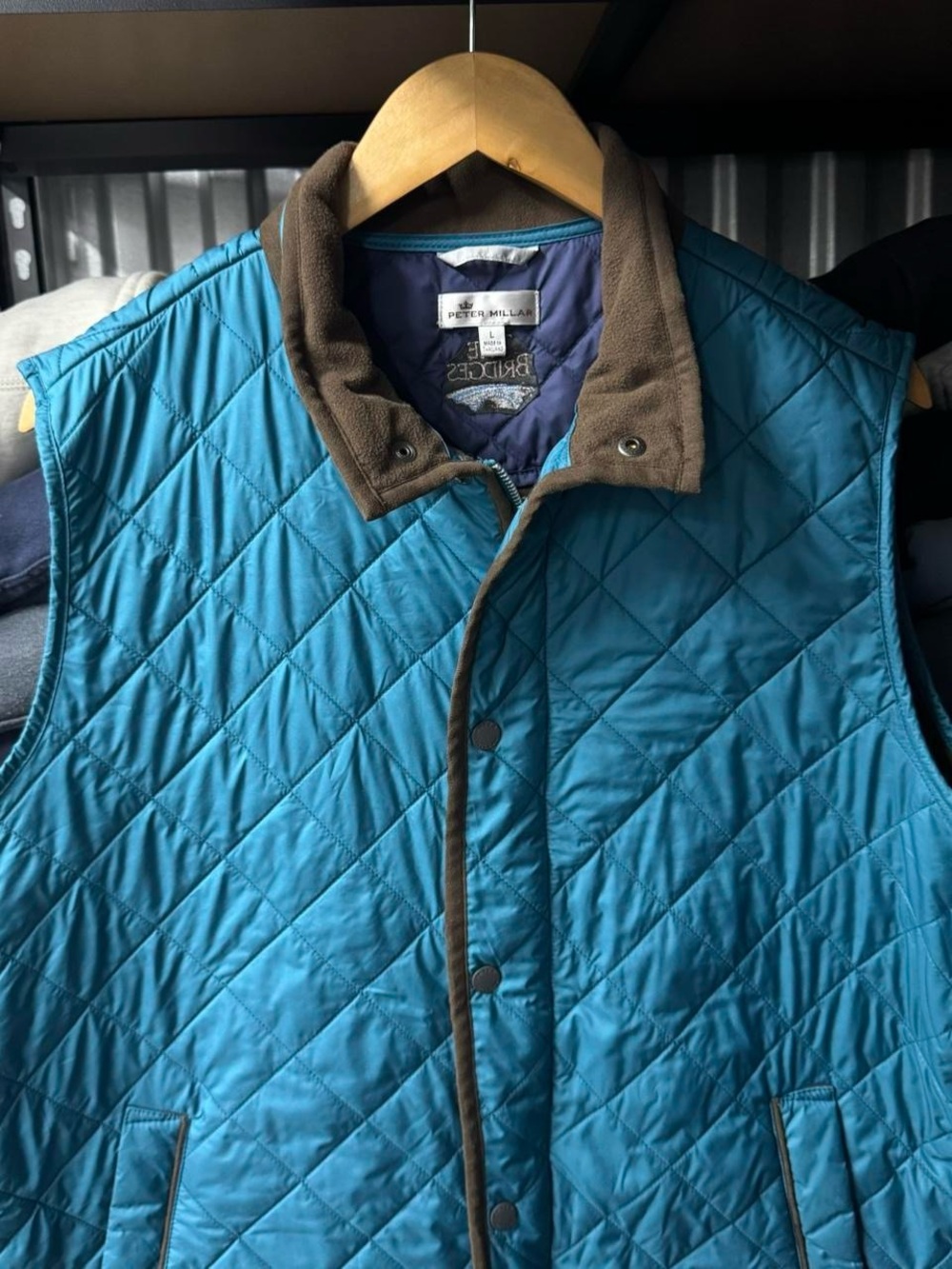 Peter Millar Quilted blue vest with brown collar outdoors gorpcore large